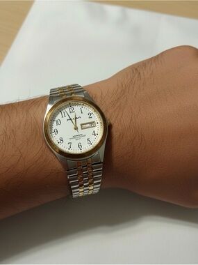 Vintage Milan MLN948 Quartz Watch Two Tone Stainless Steel Back Day Date Japan